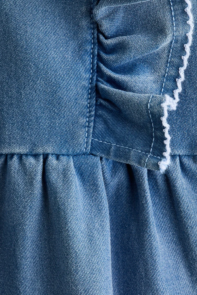 اتش اند ام فستان بتصميم سويت شيرت بتفاصيل كشكشة